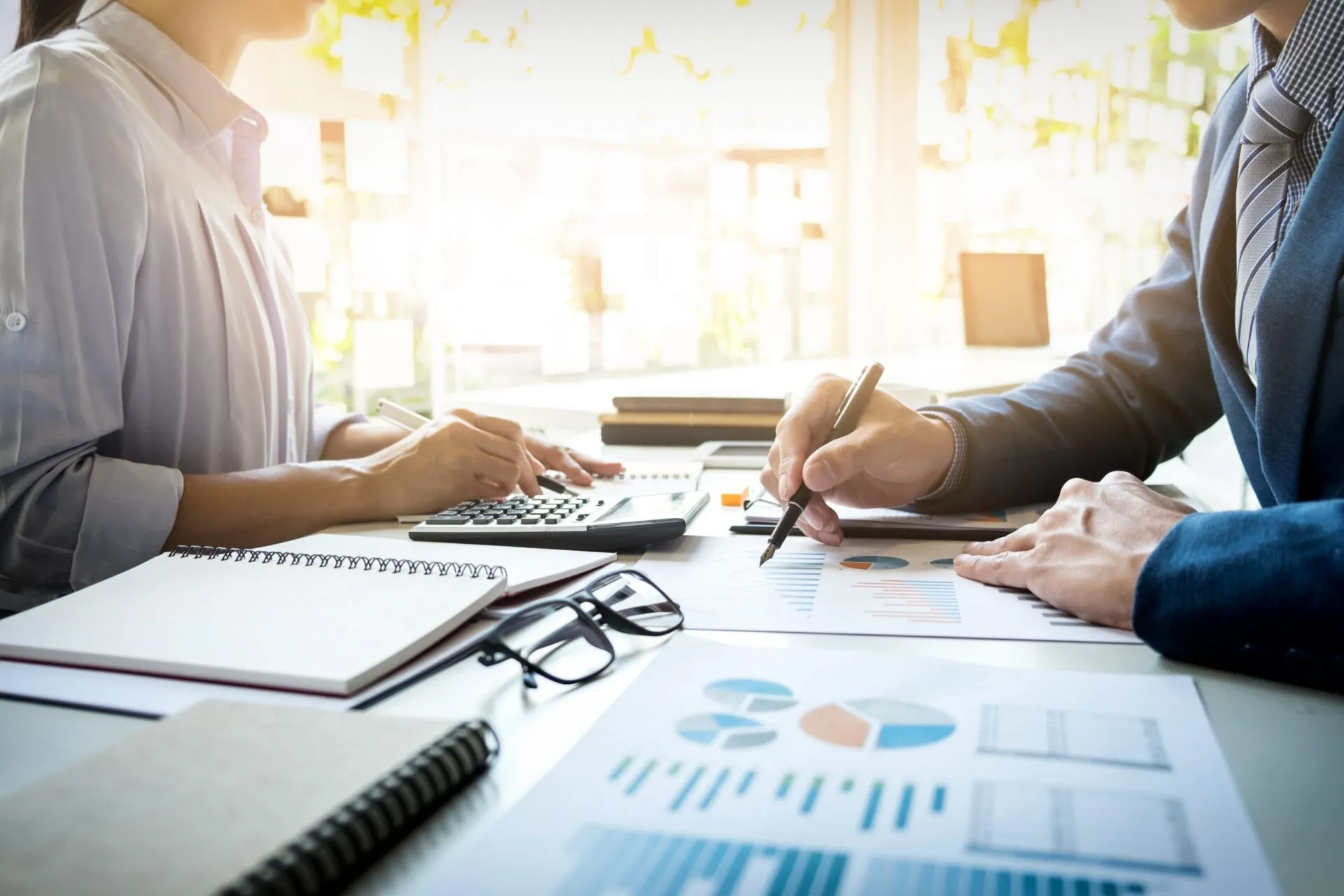 Tax Planning Attorney in Nevada discussing financial documents.